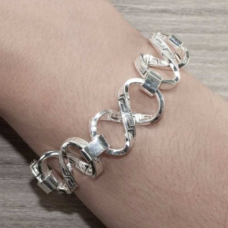 Pulsera eslabón infinito labrado griego Plata...